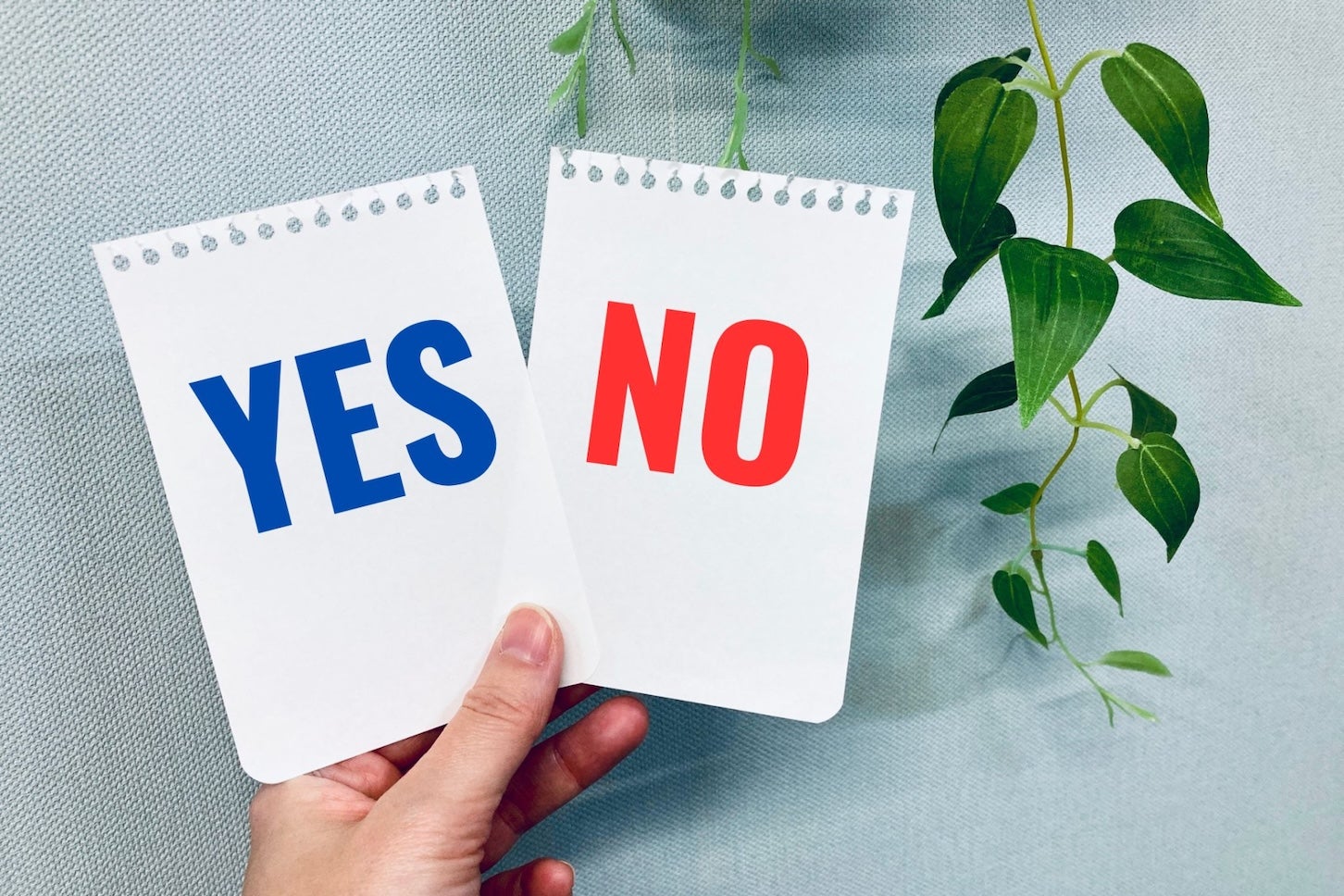 YESとNOと書かれたメモ帳のイメージ