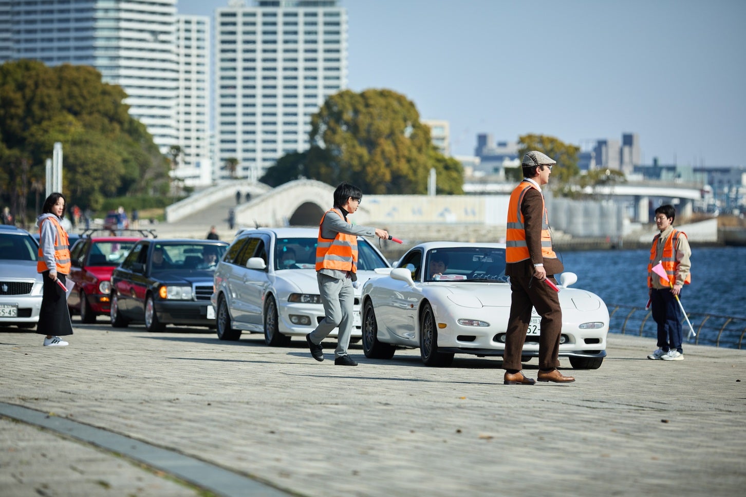 イベント会場の誘導は、YCSと親交のあるクルマ好きの仲間たちが担当。運営にも慣れている様子で、安心感のある対応が印象的でした。