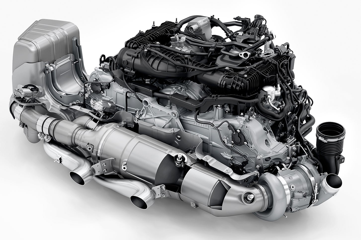 ポルシェ911カレラGTS（992.2型）｜新開発の3.6リッター水平対向6気筒エンジンは、これまでの911エンジンの伝統を受け継ぐコンパクトなパッケージ。T-ハイブリッド用高電圧コンポーネントはクランクケース上部に配置。