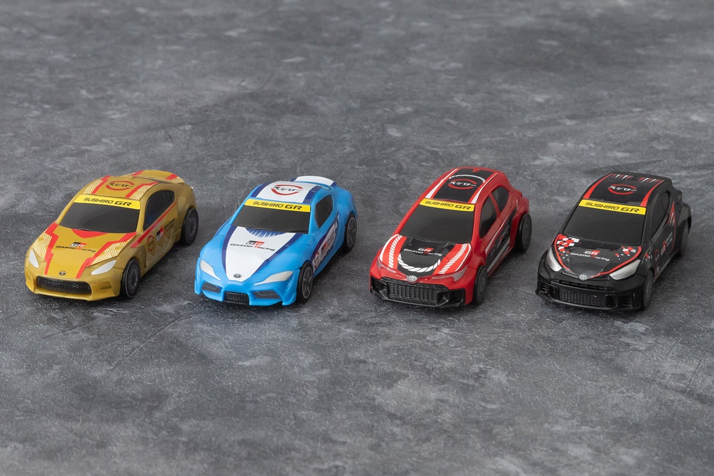 GR×スシローコラボ限定ミニカー。左から「GR86」「GRスープラ」「GRカローラ」「GRヤリス」